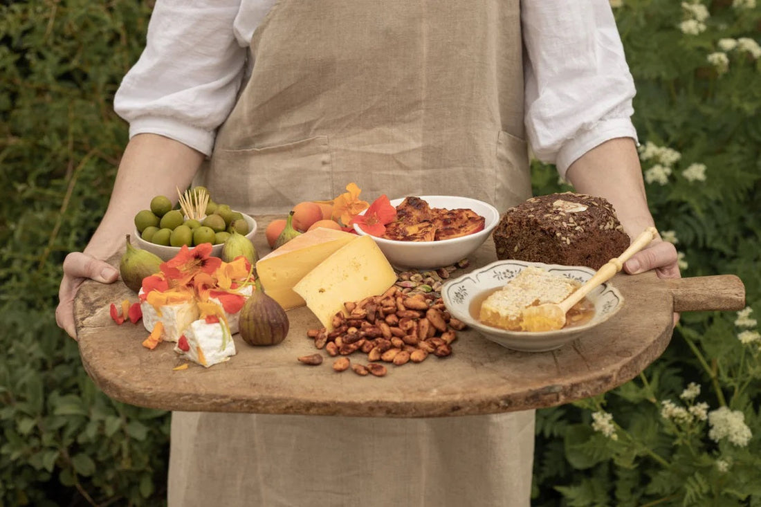 Woman with cheese board